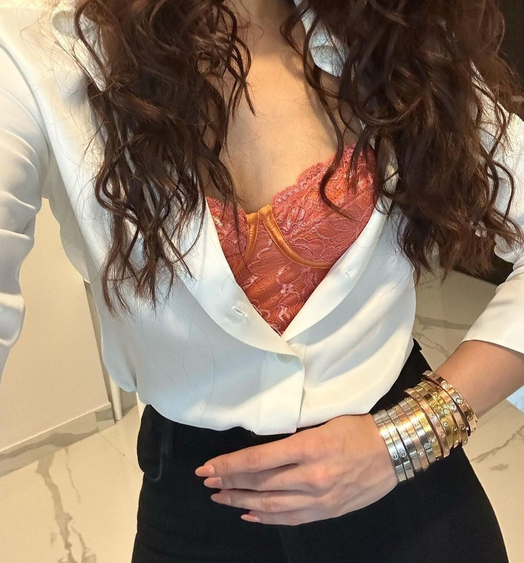 a model wearing harshi anti tarnish dailywear bracelets combo on her hand